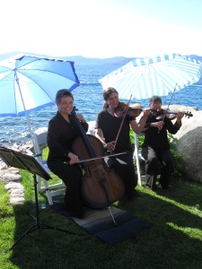 Sierra Strings Wedding Music in Tahoe Trio Under Umbrellas